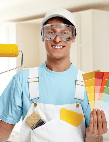 A professional painter holding color swatches and paint roller, showcasing high-quality paint products from AirGearPro for home decoration and renovation projects.